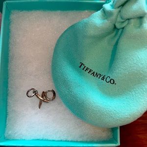 Tiffany & Co Paloma Picasso XO charm. With bag, box, ribbon, and pouch.